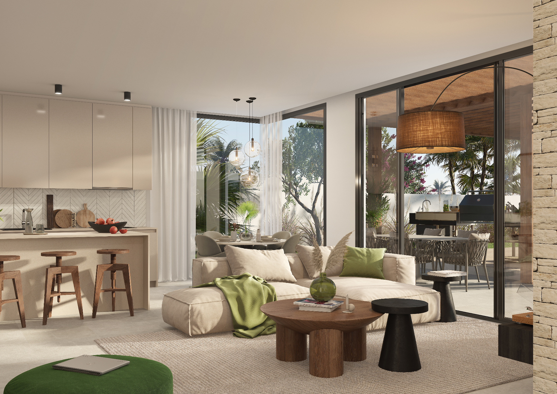 Raya villa living and dining room beside a private garden in Jebel Sifah, Oman